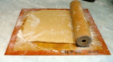 Flattening down the dough!